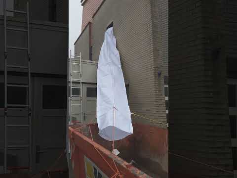 Construction waste straight into the container!, Flexible rubble chute from Stortslurf®