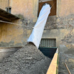 Scaffold chute for renovation waste at a window — thumbnail