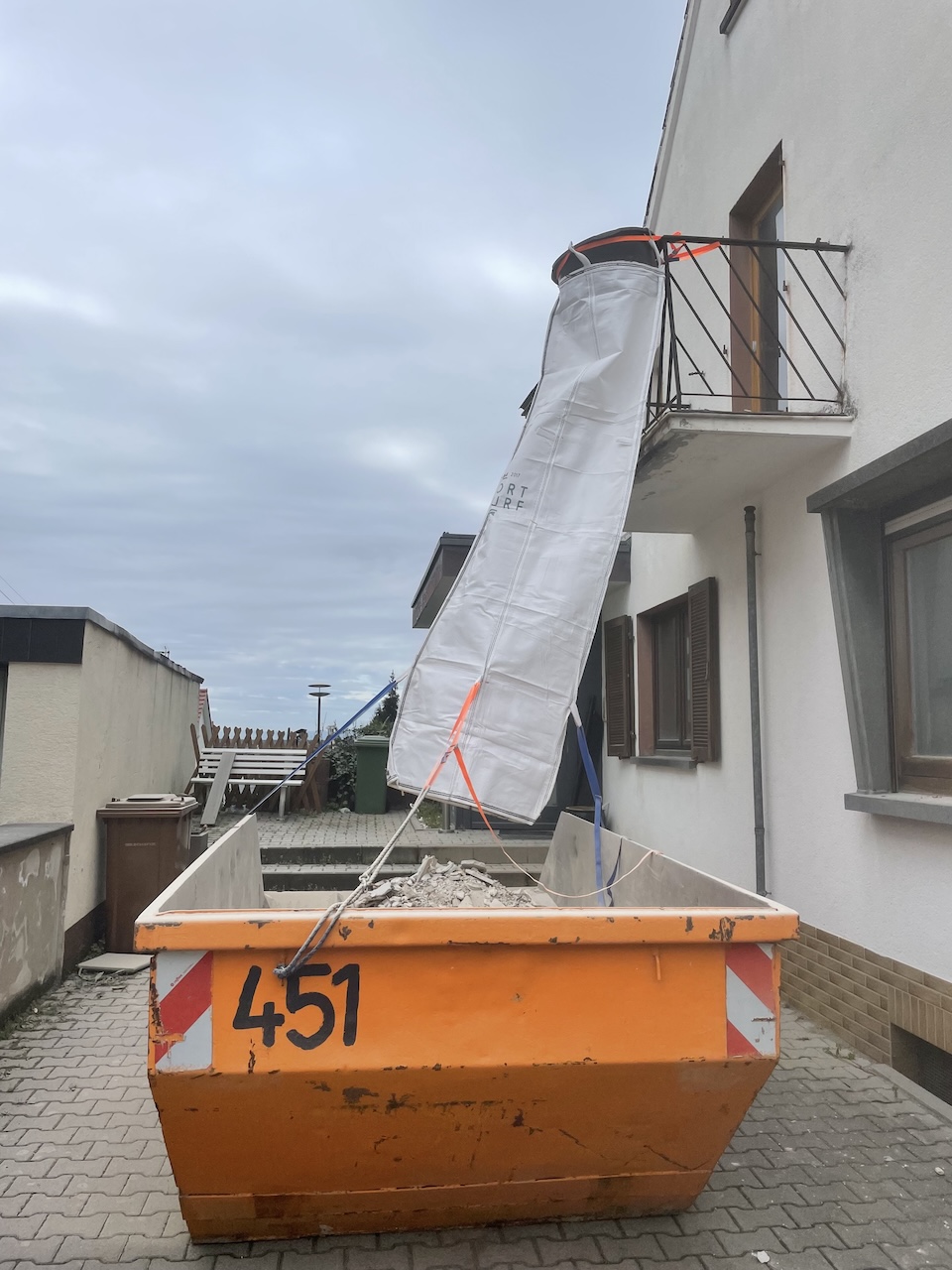 Flexible debris chute in use on site