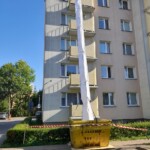 Debris chute in use during façade renovation — thumbnail