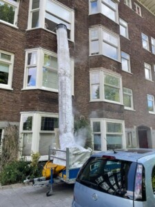 Stortslurf flexible rubbish chute in use — product photo 02