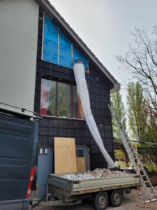 Stortslurf flexible rubbish chute in use — product photo 04