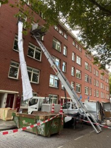 Stortslurf flexible rubbish chute in use — product photo 05