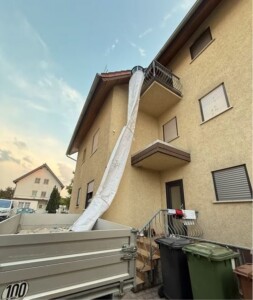 Stortslurf flexible rubbish chute in use — product photo 09