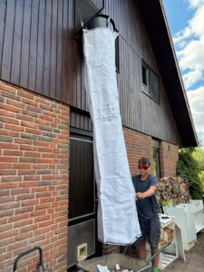 Stortslurf flexible rubbish chute in use — product photo 15